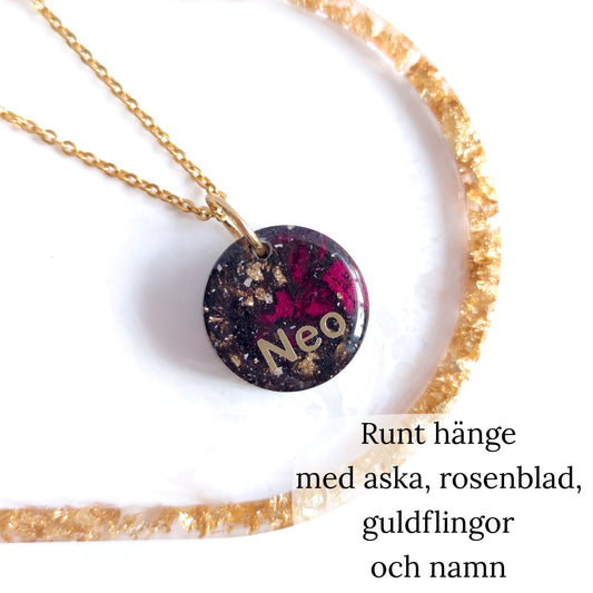 Runt hänge med hår/päls/tagel eller aska